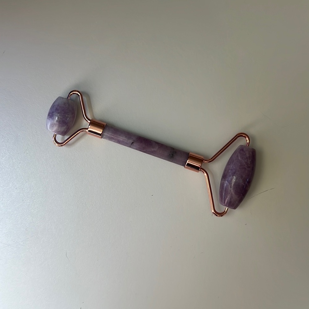 New Exuviance Stone Facial Roller